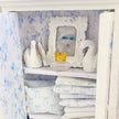 Chantallena White Bed Linens White Shabby Decoupaged Hutch with Blue Linens-1:12 Scale |Painted Petals Furniture |Chantallena